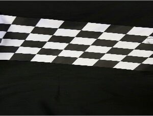 A picture of the museum checkered flag on the black