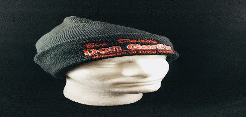 A mannequin head with a Museum Fleece Cap on it.