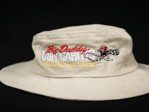 A Musuem Bucket Hat-Tan with a logo on it.