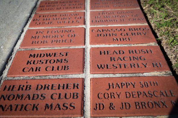 Walk of Fame Engraved Bricks on a Pavement Close up
