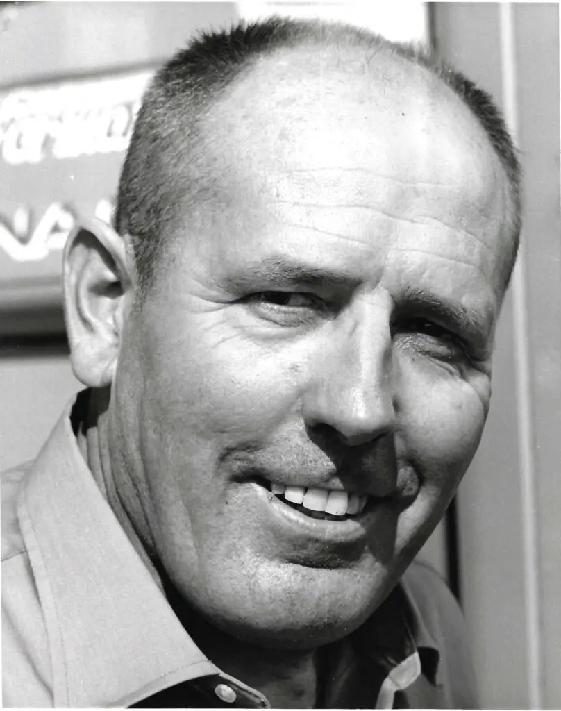 A black and white photo of Ak Miller