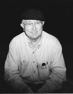 Black and white photo of Raymond Godman