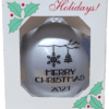 A Museum 2023 Ornament with the word happy holidays on it.
