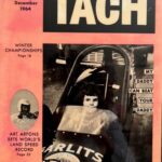 The cover of tach magazine with an image of a woman in a car racing.