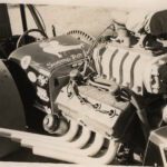 A black and white photo of a drag racing car engine.