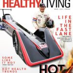 The cover of healthy living magazine featuring a man in a race car zooming through the drag racing track.
