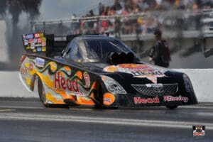 Drag racing car speeding on the track.