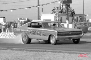 Vintage drag racing car on the track.