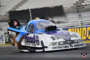 Race car speeding on a track.