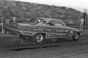 Vintage drag racing car on the track.