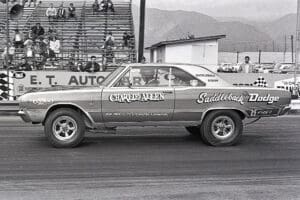 Vintage drag racing car at the track.